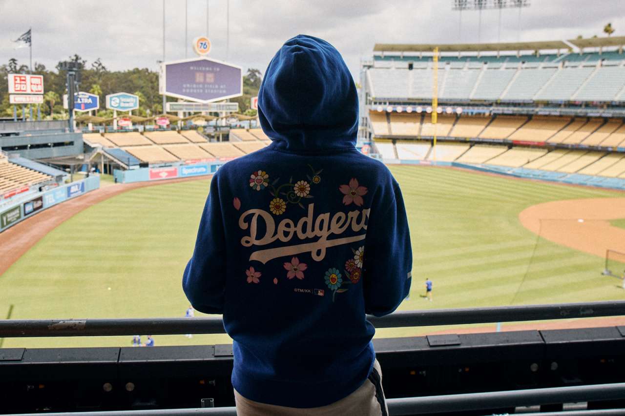 A teen oncology patient looks out toward the field inside Dodger Stadium.