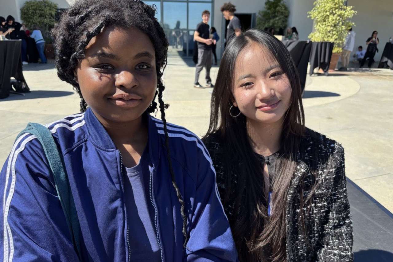 Two high school students at the Gen Z Wellness Summit.