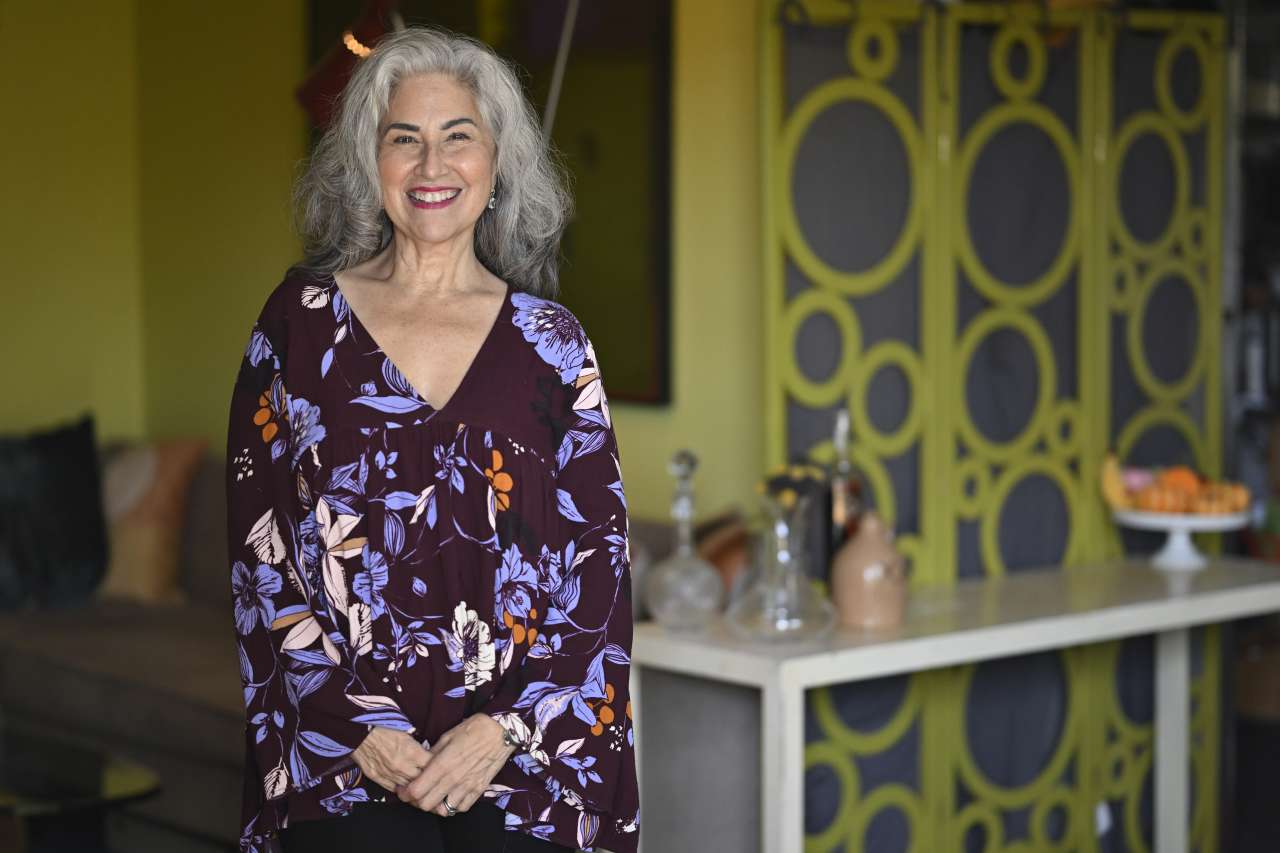 Wendy Hammers poses for a portrait in her home.