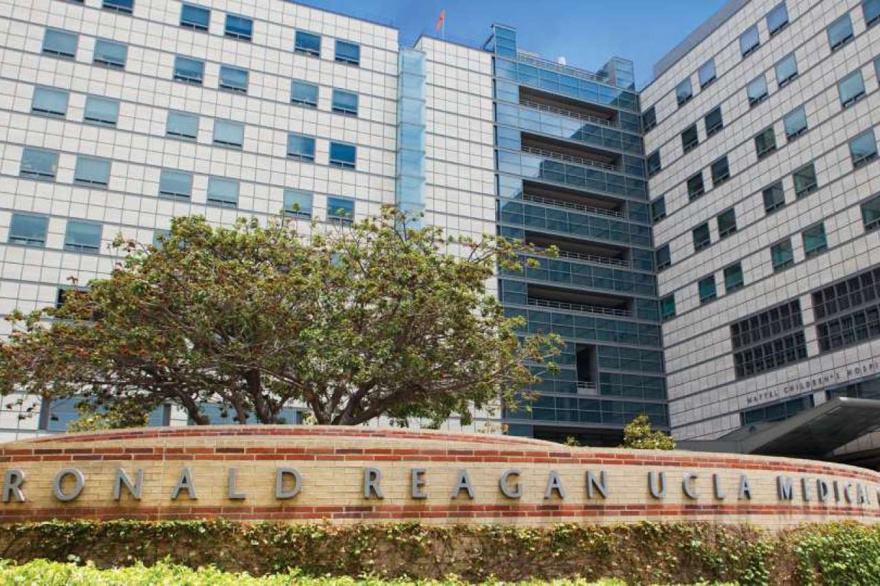 Hospital building exterior with "RONALD REAGAN UCLA MEDICAL CENTER" sign.