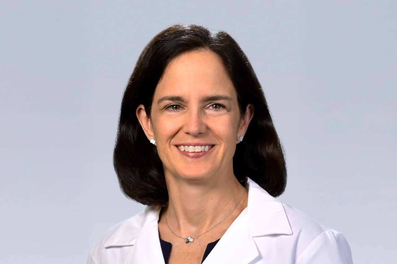 Headshot of a Dr. Susan Domchek in a white lab coat