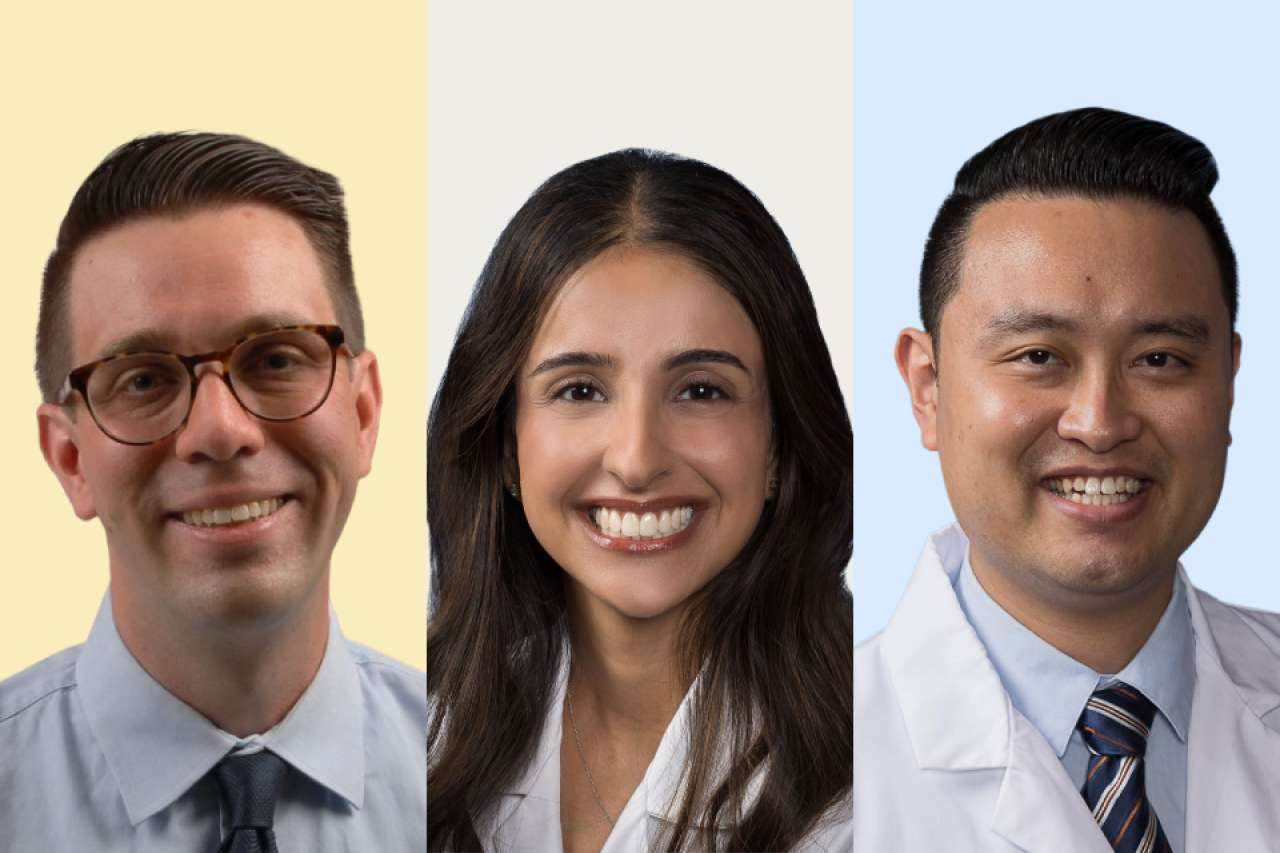 Three smiling people in white coats against pastel yellow, blue, and lavender panels.