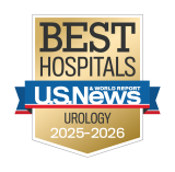 Gold badge with "Best Hospitals" at the top, a blue ribbon with "U.S. News & World Report," and "Urology 2025-2026" below.