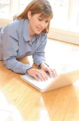 Lady typing on a laptop