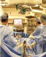 Surgeons doing minimally invasive surgery.