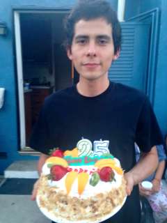 The late Robert Barajas holding a cake
