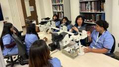 Turner‑UCLA Allied Health students tour Cytology with Po Chu Fung, senior cytotechnologist and education coordinator.