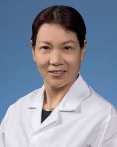 Qiuheng Jennifer Zhang, PhD in a white lab coat
