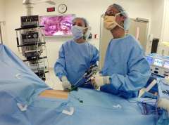 Dr. Livhits and Dr. Yeh performing single-incision retroperitoneoscopic adrenalectomy.