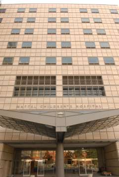 Exterior view of Mattel Children's Hospital at UCLA, featuring the building's facade and main entrance.