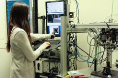 Erica operating the stereotactic apparatus for electrophysiology experiments.
