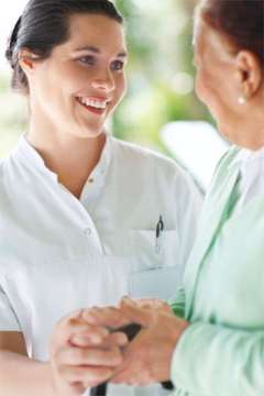 Pulmonary nurse speaking with an older patient
