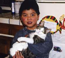 Justin Low with his cat