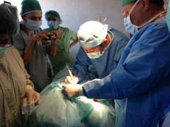 Surgeons performing surgery