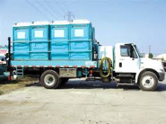 Truck with portable toilets