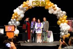Darnell Bagsik at pinning ceremony with faculty