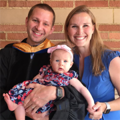 Chris Childers, MD PhD and family after graduating with his PhD through the STAR program