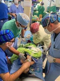 Surgeons operating on patient in Guatemala