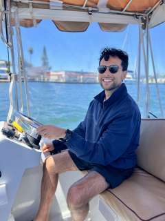 Dr. Husein on a boat