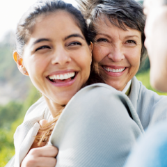 hugging mom and daughter