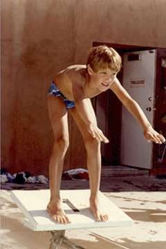Young Leigh C. Reardon on a diving board
