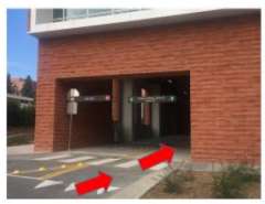 Arrows pointing to parking garage