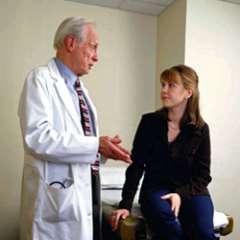 Doctor speaking with patient