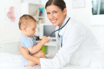 doctor and child with stethascope