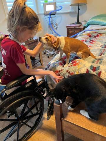 Molly Lacey with her dog and cat