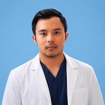 Zealouie De Guzman wearing white lab coat and navy scrubs against blue background
