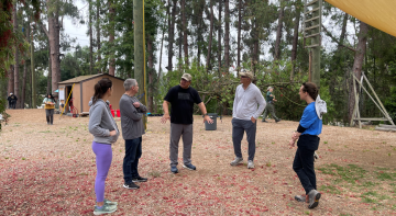 Five DAPM team members at Bioinformatics retreat at rope courses in the forest.