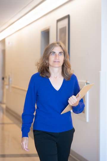 Dr. Laurie Casaus in hospital hallway.