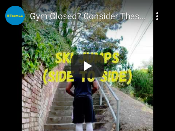 A man stands on stairs with text "SKY JUMPS (SIDE TO SIDE)" overlaying the video image. The video's title is "Gym Closed? Consider Thes...".