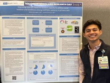 Nathan McLaughlin Presenting a Research Poster