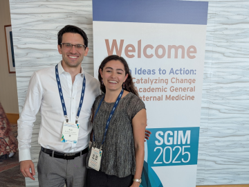 Ilana Brody and her mentor at the SGIM 2025 Meeting, posing in front of the "welcome" sign