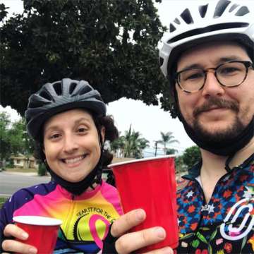 Emma and friend wearing bike helmets