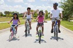 Family riding bikes together