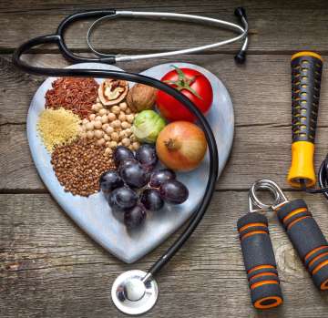 Healthy lifestyle concept with diet and fitness on wooden boards