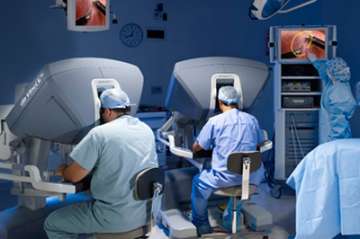Surgeons performing robotic surgery