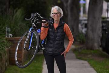 Jill Wesiman holding her bike