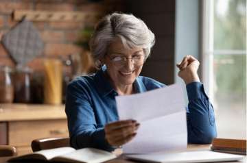 woman reading letter