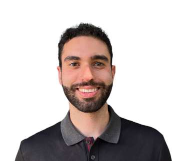 Head shot of Nicholas Kopooshian, MD in a polo shirt, smiling at camera