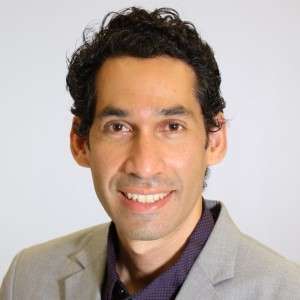 Head shot of Jesus Campagna smiling at the camera