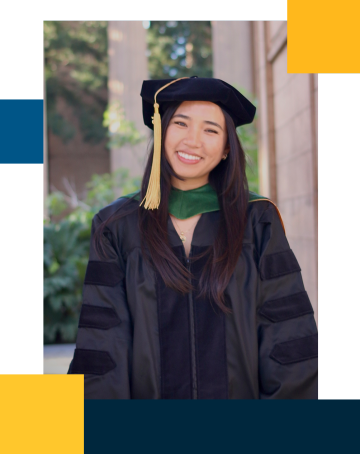 Michelle is smiling, wearing medical school graduation regalia with a black robe, black cap, and gold tassel