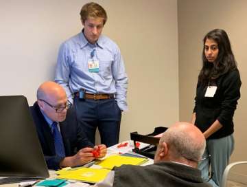 Dr. Glenn Van Arsdell, head of Congenital Heart Surgery, reviews a 3D model for surgery with Dr. Gary Satou and Pediatric Cardiology fellows.