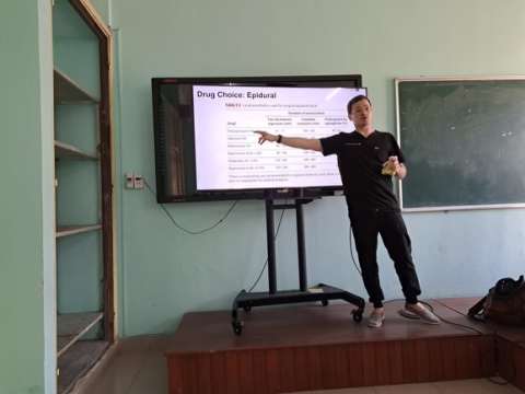 Dr. Jordan Francke teaching about epidurals in Vietnam