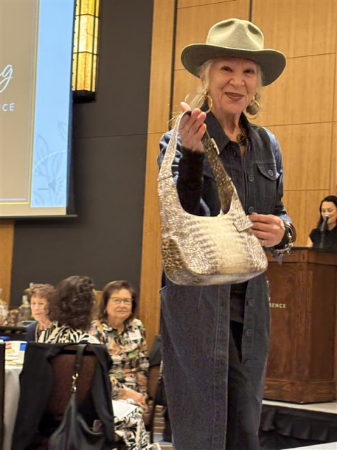 A woman in the UCLA Thrift Shop fashion show.