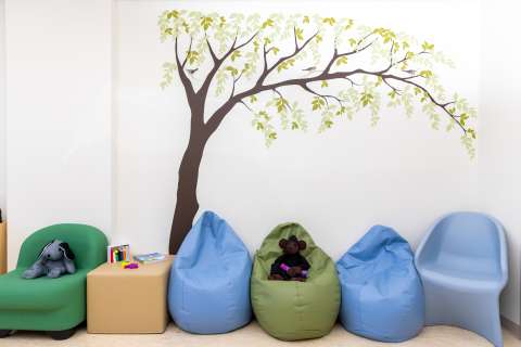 Sensory Room area  with bean bag chairs and stuffed animals. 