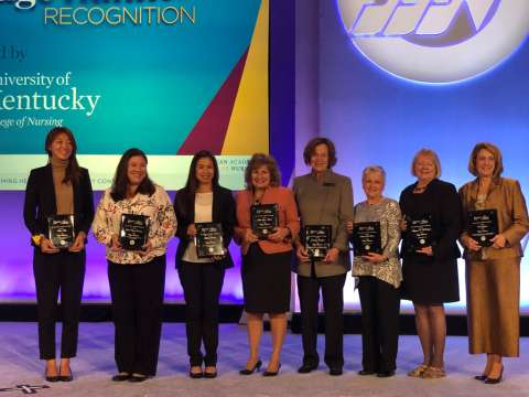 Nurses receiving awards in edger runner recognition