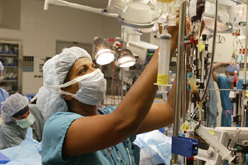 Nurse adjusting an IV